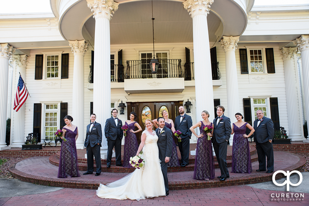 Epic wedding party photo in front of the Ryan Nicholas Inn.