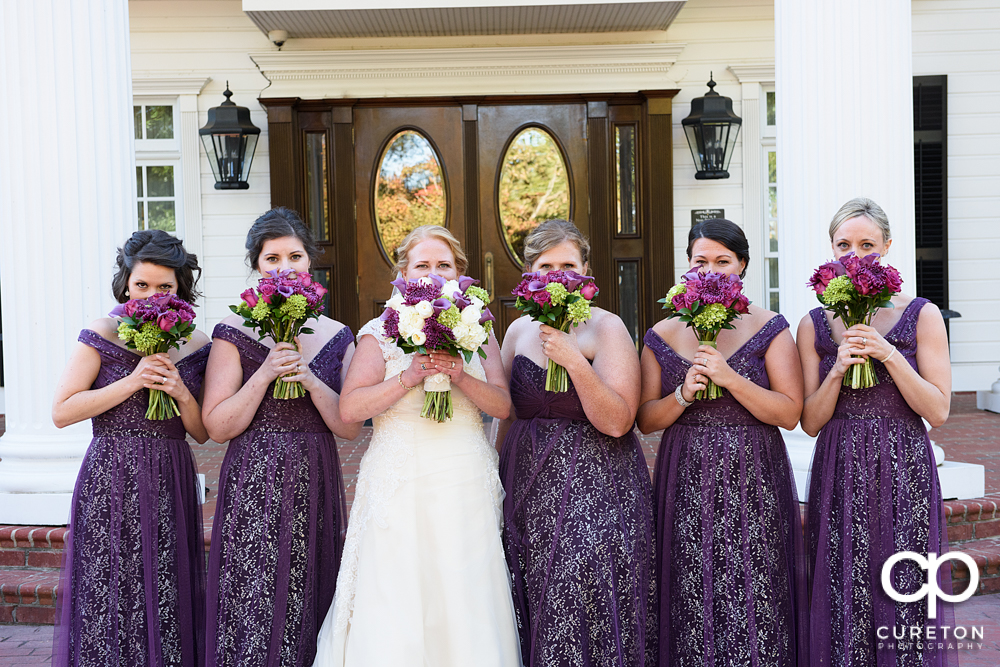 Bridesmaids with flowers.