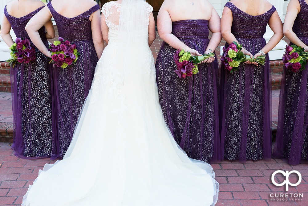 Back shot of the bride and bridesmaids.