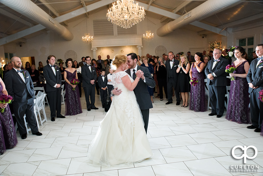 Bride and groom first dance in the pavilion.