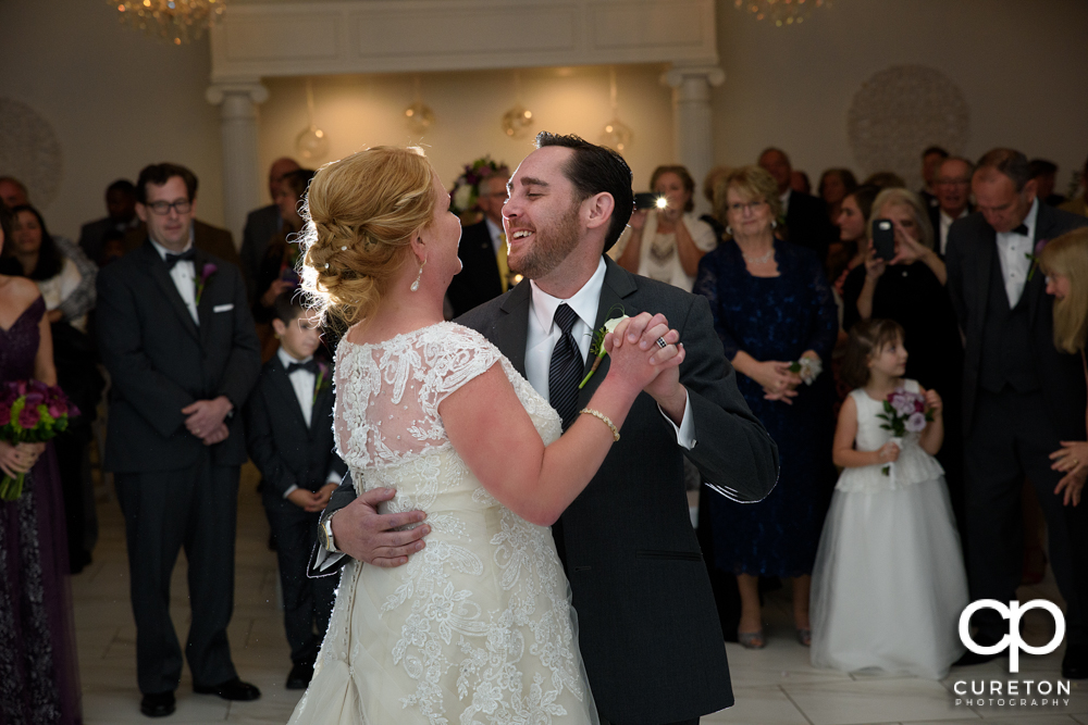 Bride and groom first dance in the pavilion.