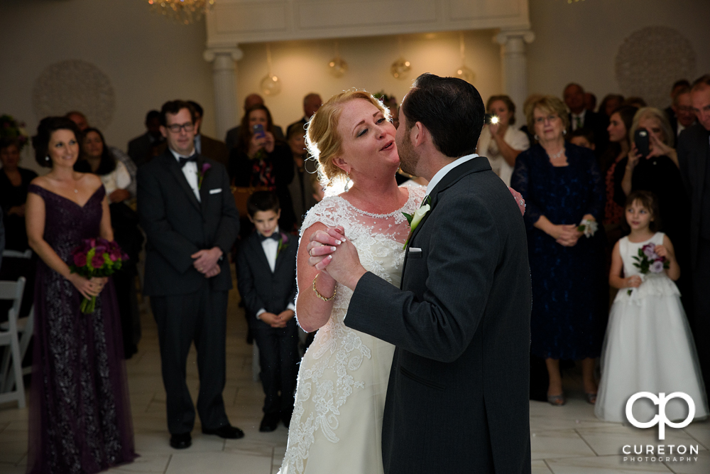 Bride and groom first dance in the pavilion.