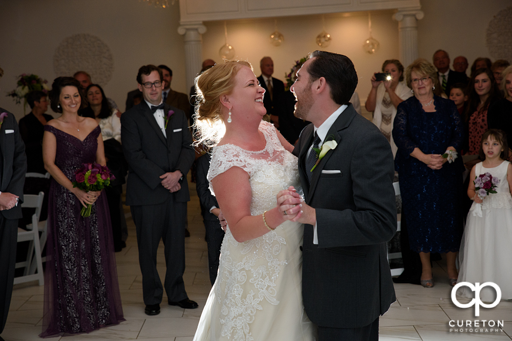 Bride and groom first dance in the pavilion.