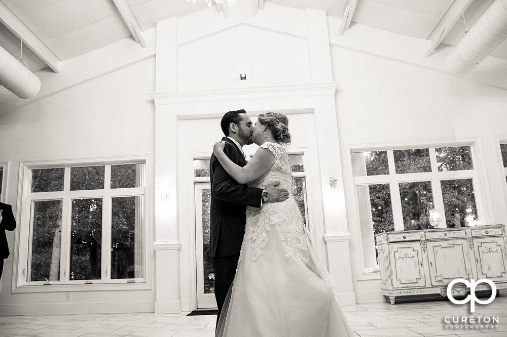 Bride and groom first dance in the pavilion.