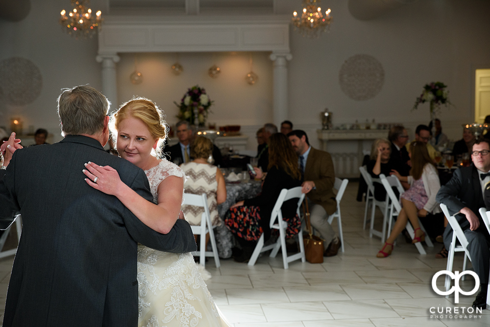 Bride and father dance.