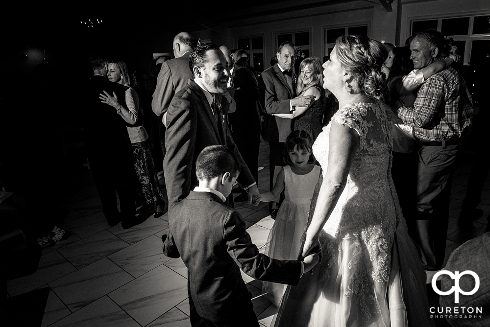 Guests dancing in the pavilion at the reception.