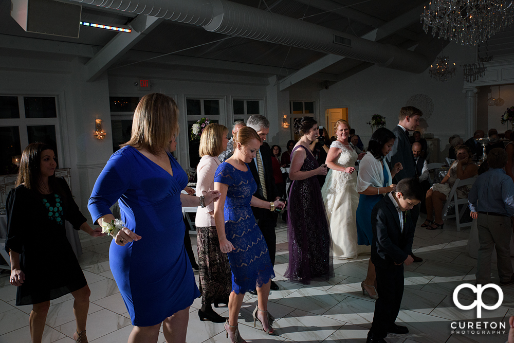 Guests dancing in the pavilion at the reception.