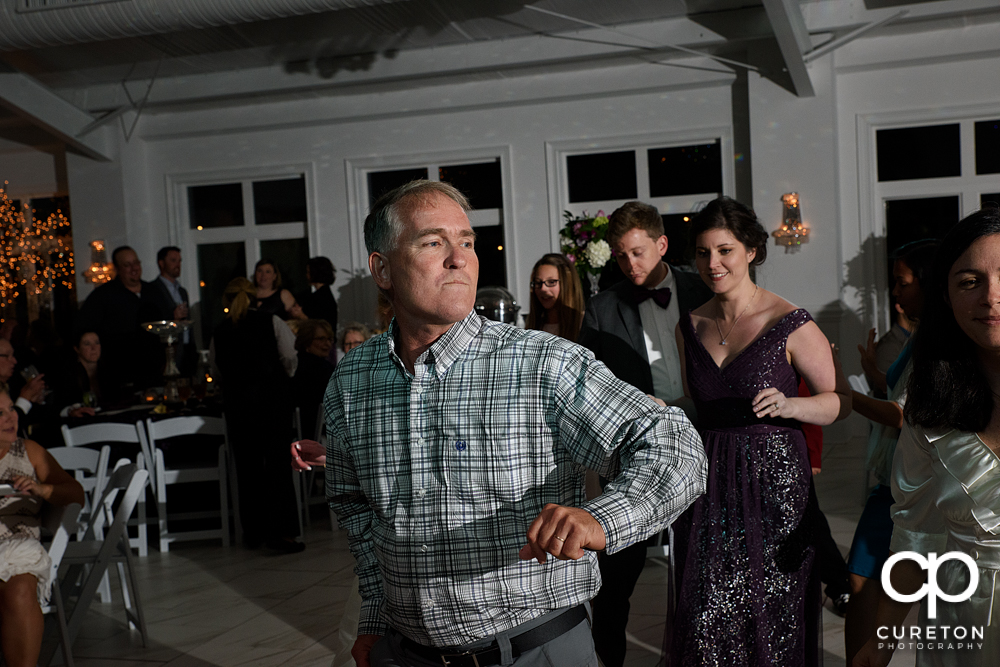 Guests dancing in the pavilion at the reception.