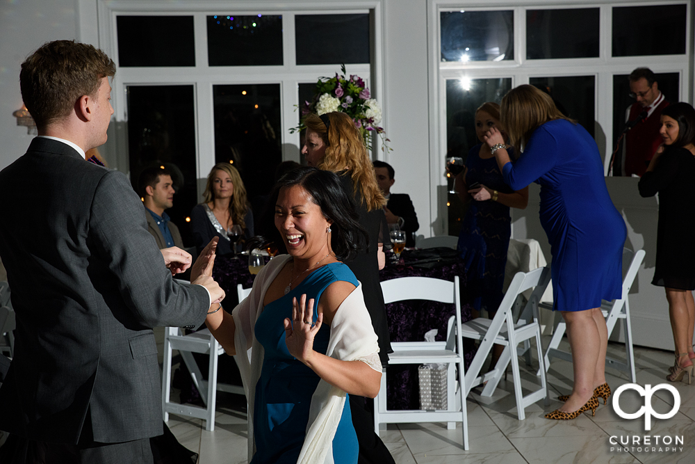 Guests dancing in the pavilion at the reception.
