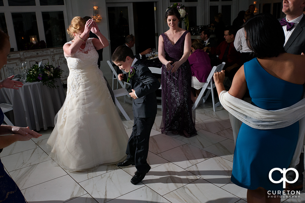 Guests dancing in the pavilion at the reception.