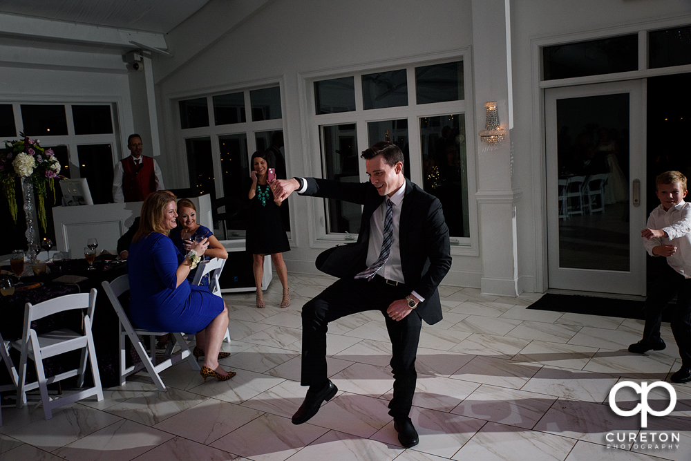 Guests dancing in the pavilion at the reception.