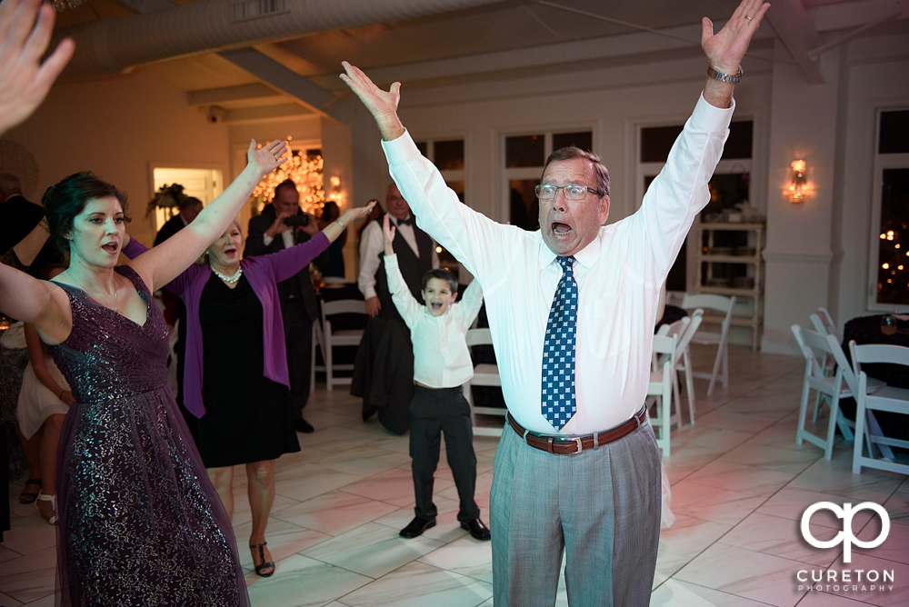 Guests dancing in the pavilion at the reception.