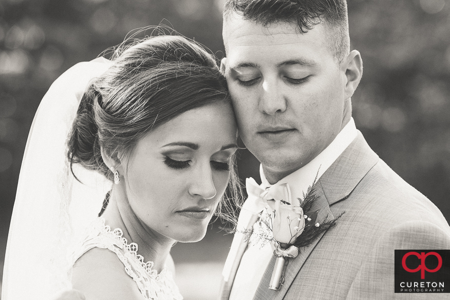 Gorgeous black and white photo of the bride and groom.