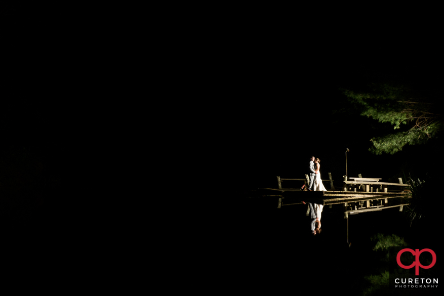 Couple by teh lake at Song Hill Reserve.