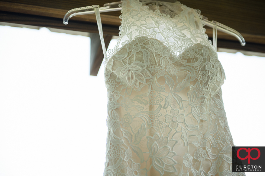 Closeup of the wedding dress.