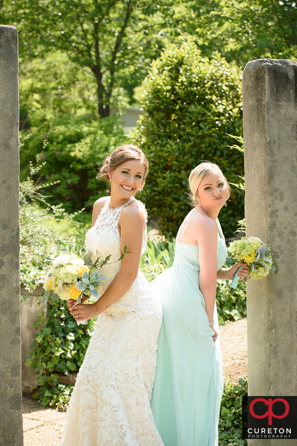 Bride having fun posing with her brdesmaids.