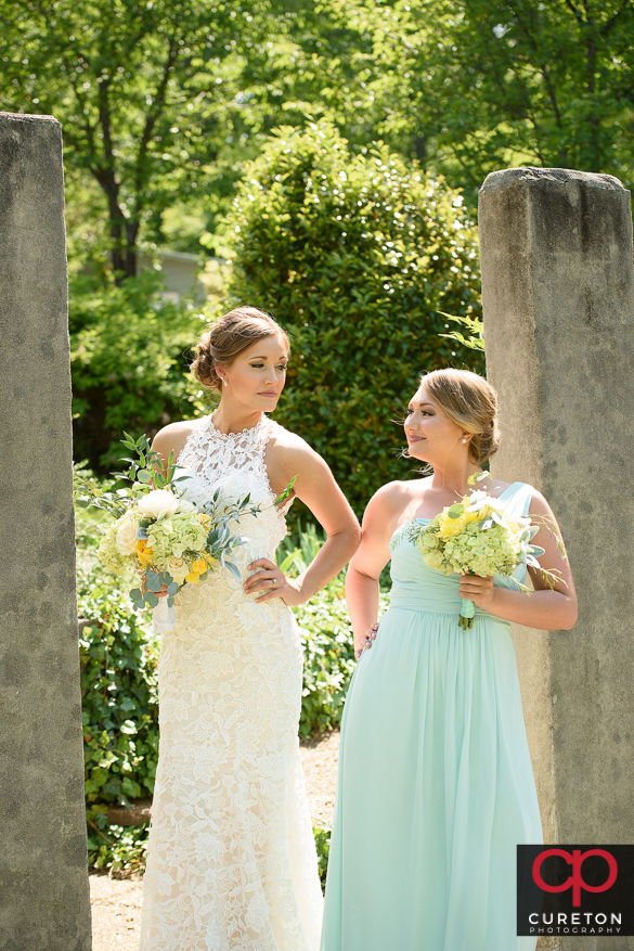 Bride having fun posing with her brdesmaids.