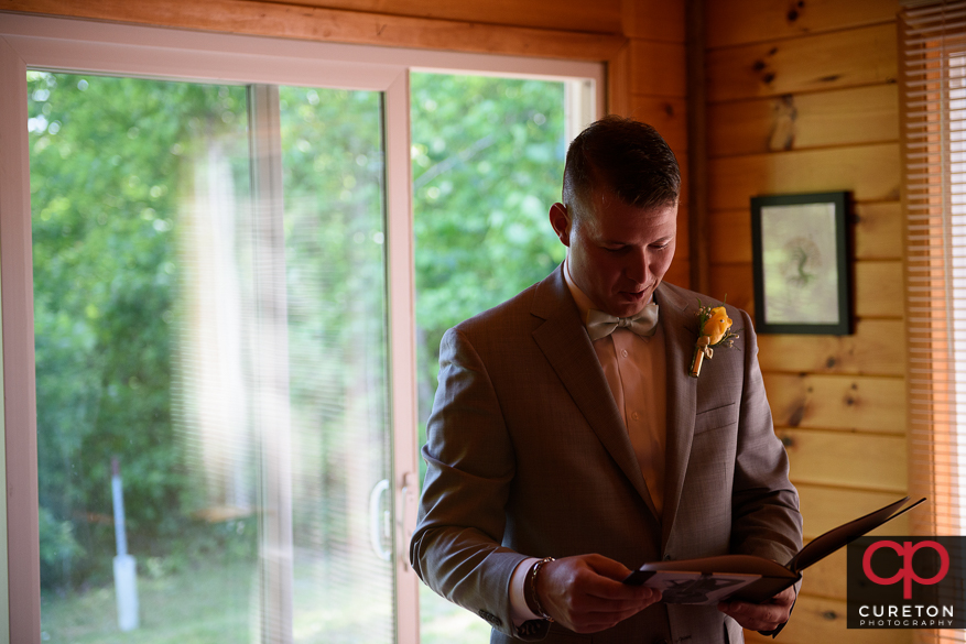 The groom receives his gift from his bride to be.