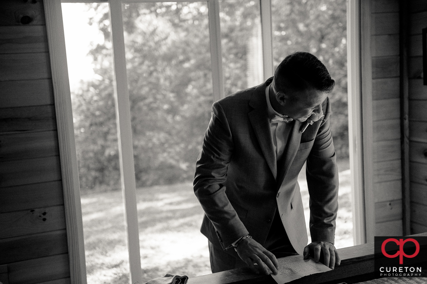 The groom receives his gift from his bride to be.