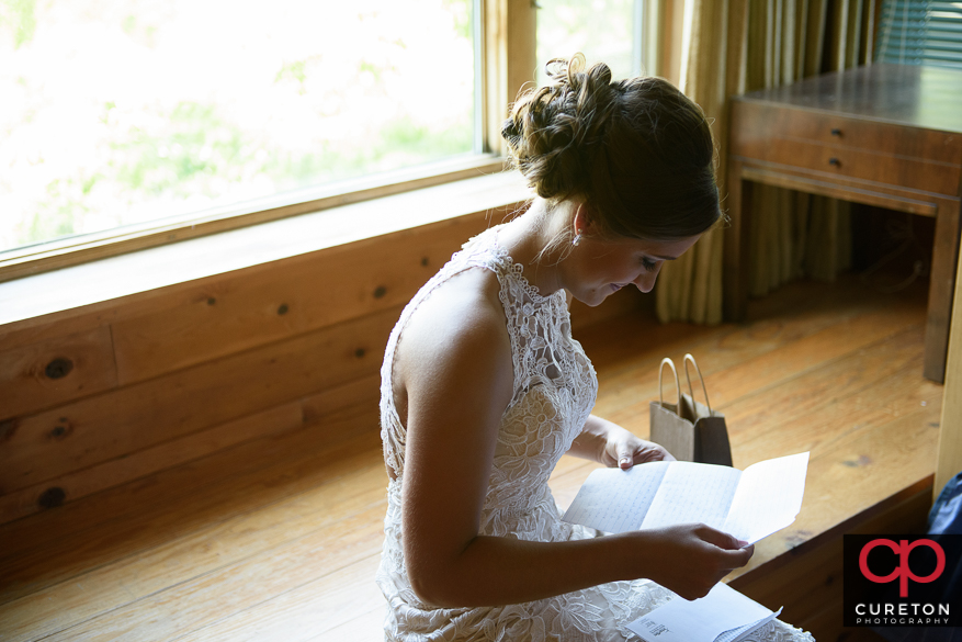 The bride receives her gift from the groom.