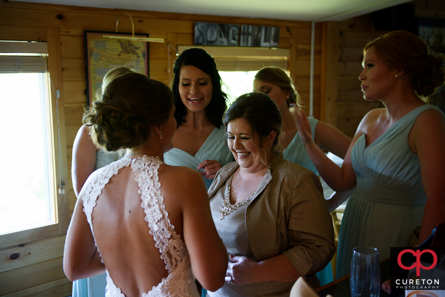 The bride receives her gift from the groom.