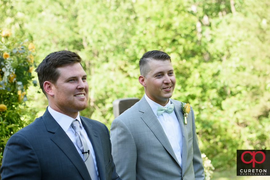 The groom sees his bride for the first time.