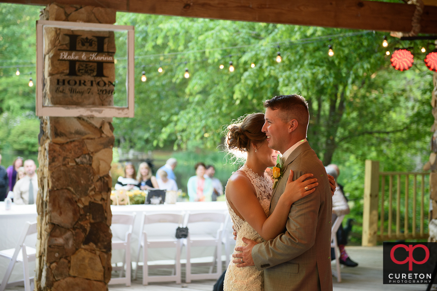 Bride and groom having their first dance.