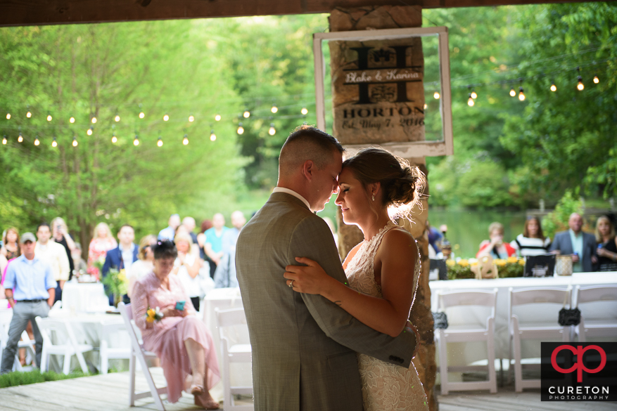 Bride and groom having their first dance.