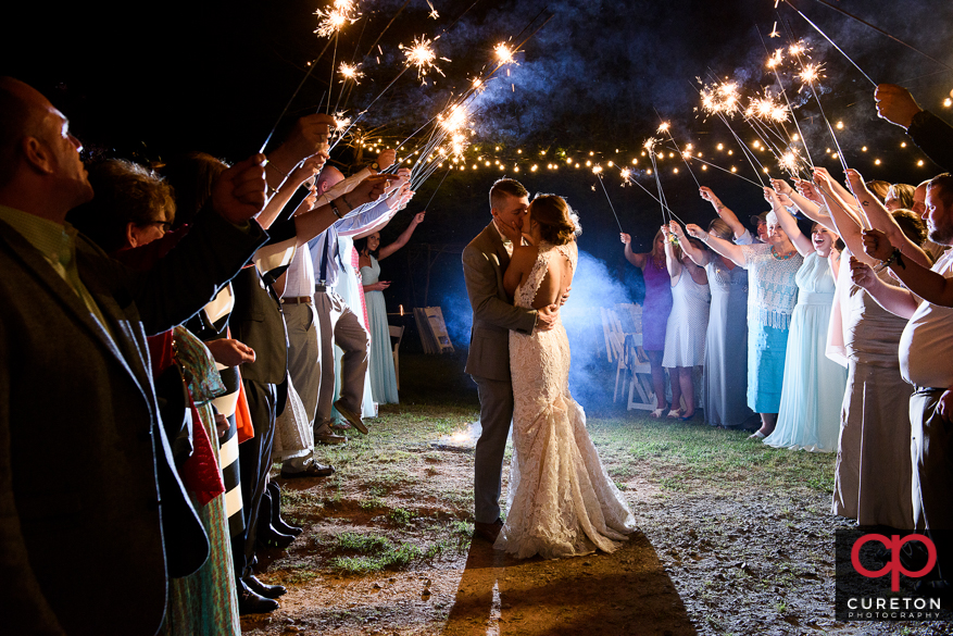 Bride and groom have an epic sparkler leave after the wedding reception at Song Hill Reserve.