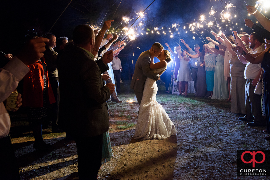 Bride and groom have an epic sparkler leave after the wedding reception at Song Hill Reserve.