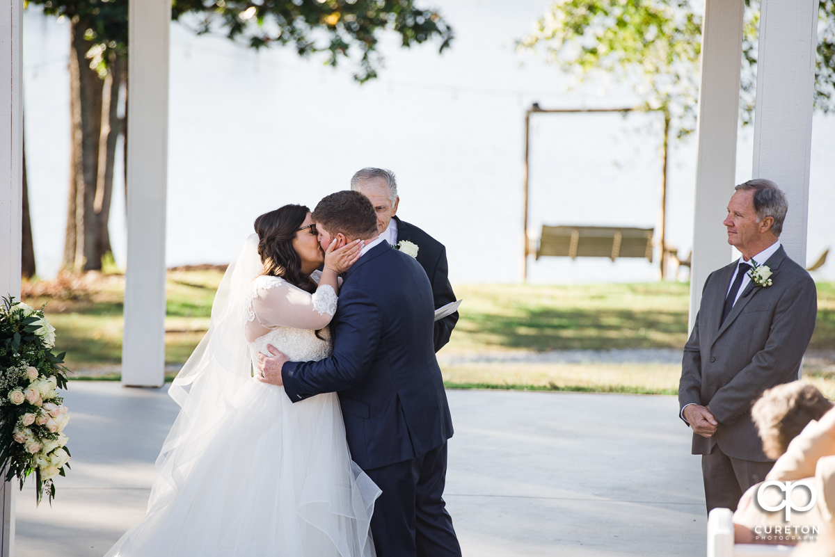 First kiss at the wedding ceremony.