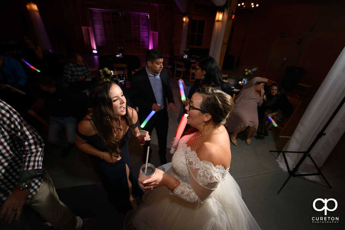 Bride dancing with her guests.