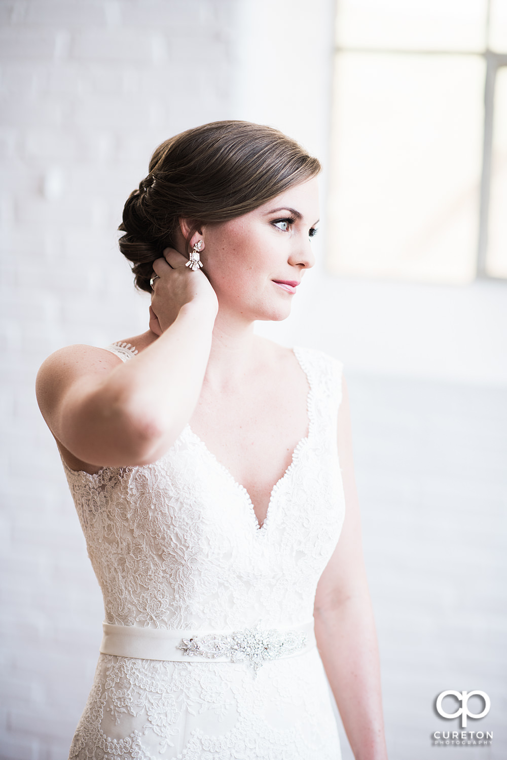 Bride in gorgeous window light.