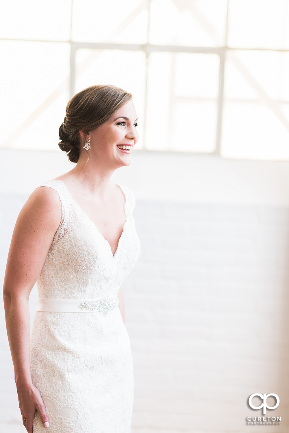 Bride laughing during her pre-wedding bridal session.