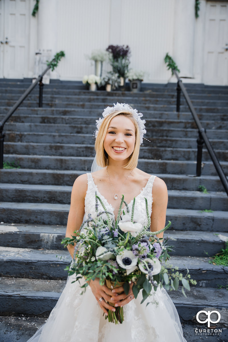 Bride holding a beautiful bouquet.