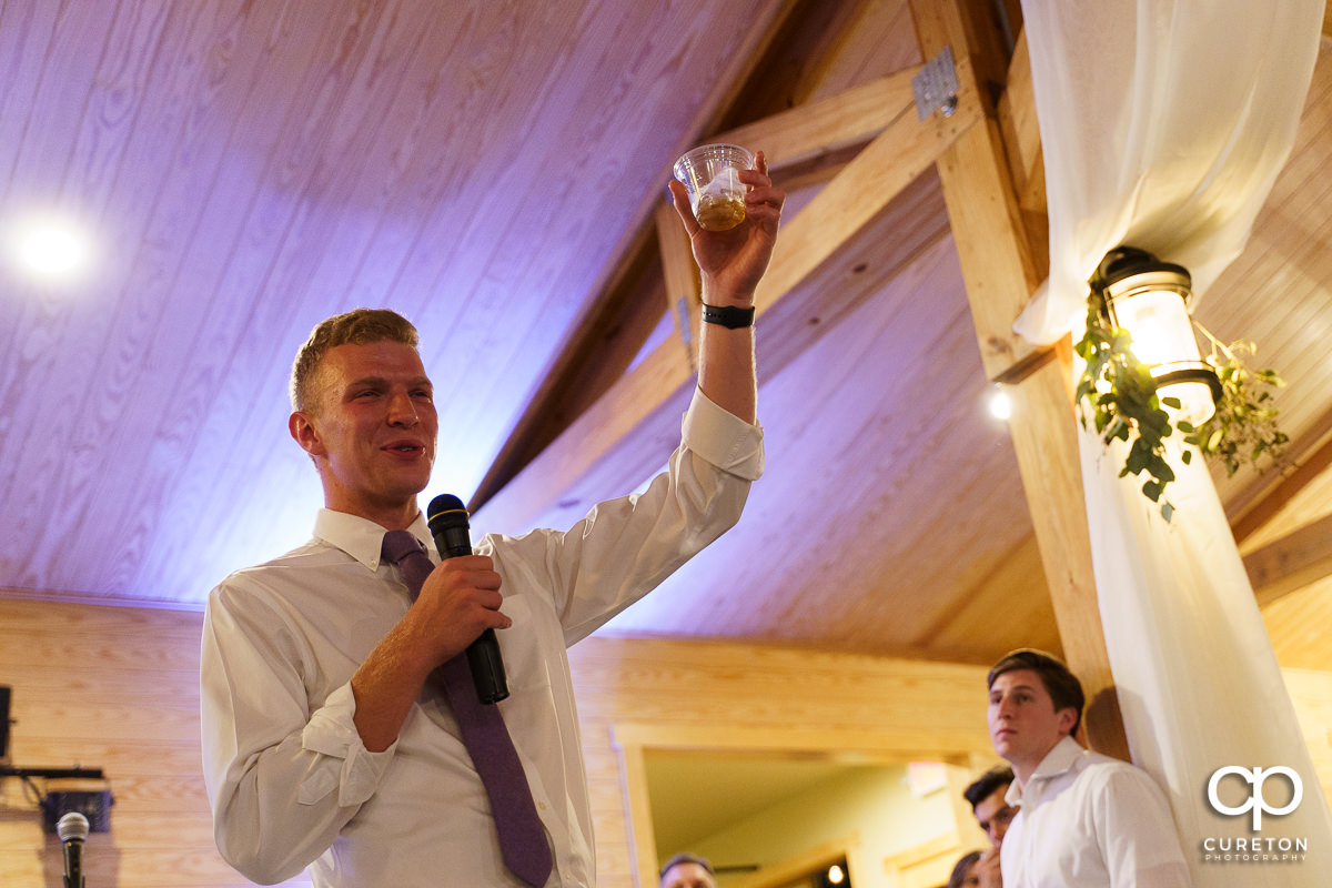 Groomsmen giving a speech.