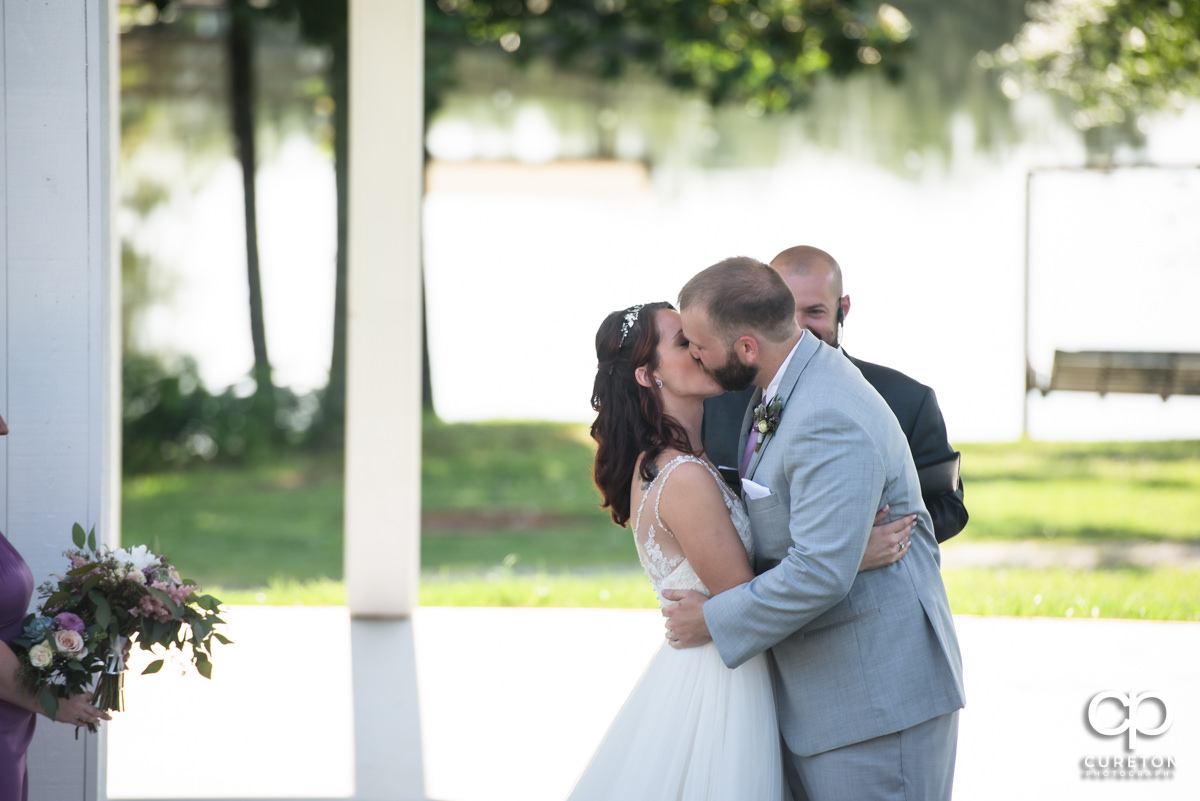 First kiss at the wedding.