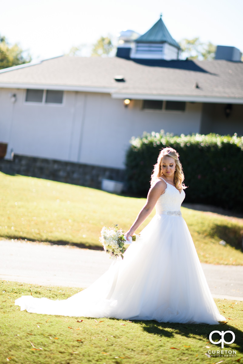 Beautiful bride in glowing sunlight.