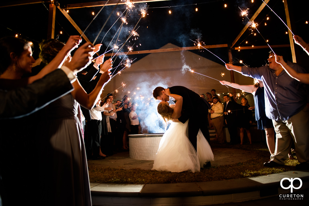 Bride and groom epic sparkler exit at the Spartanburg Country Club wedding reception.