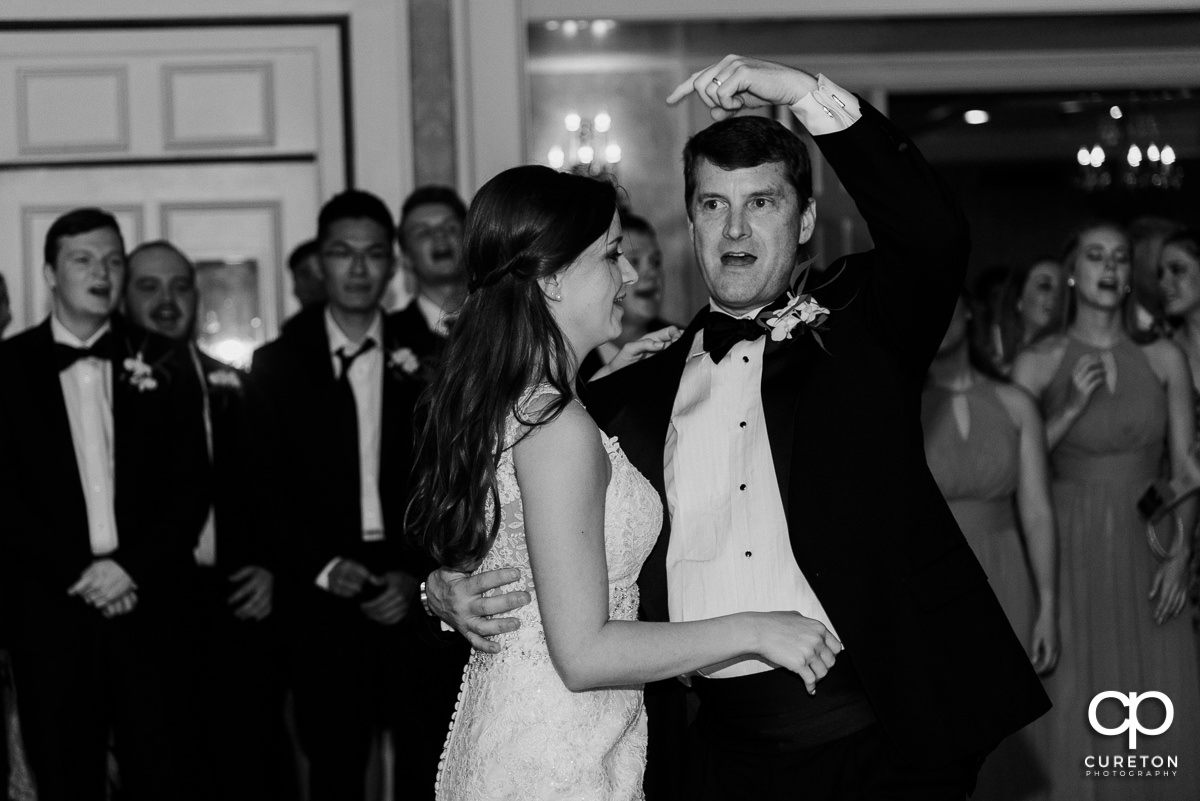 Bride dancing with her dad.