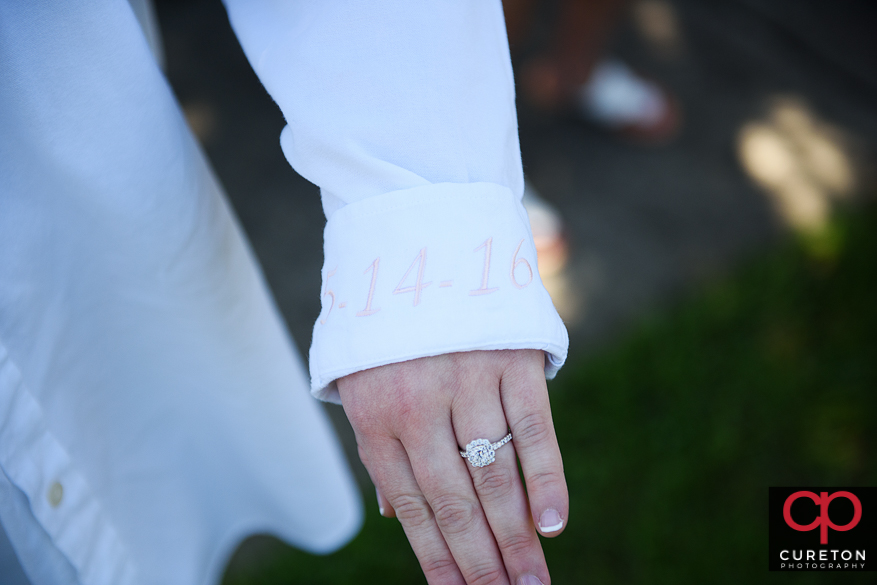 Teh brides shirt with the date on it.