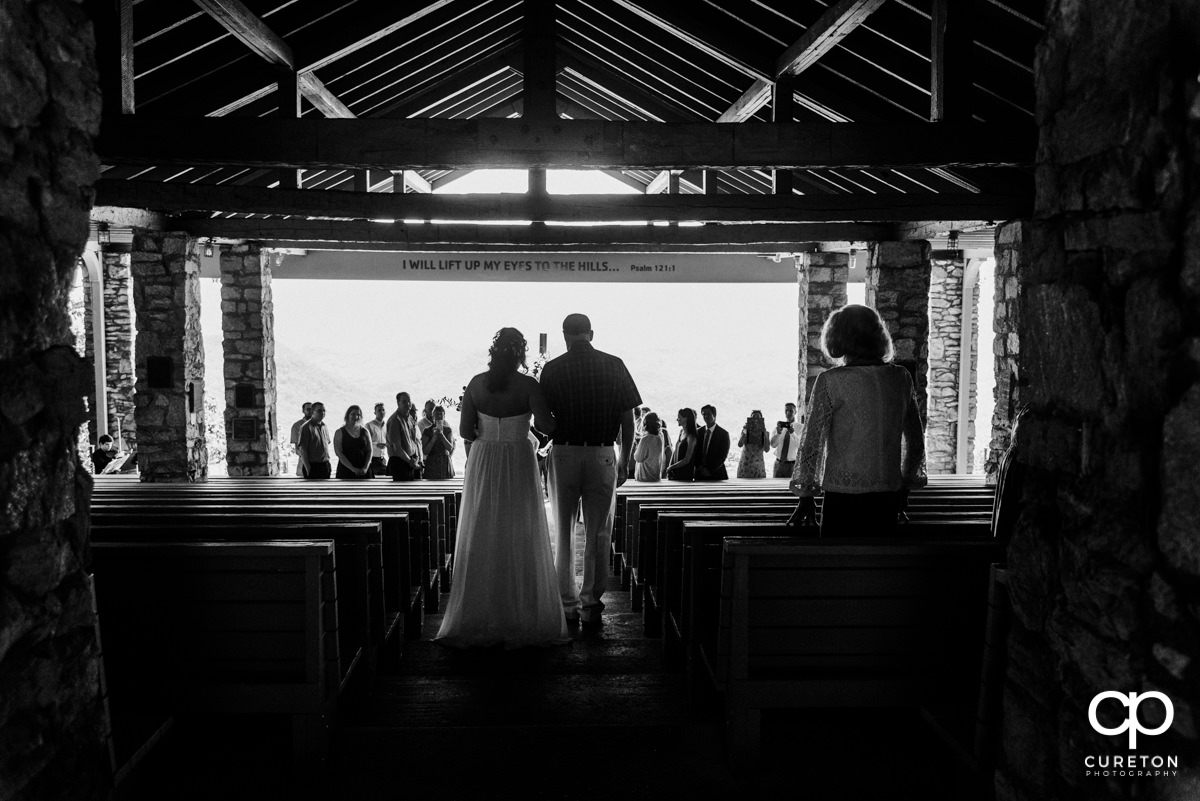 Bride and her father walking down the aisle at Pretty Place.