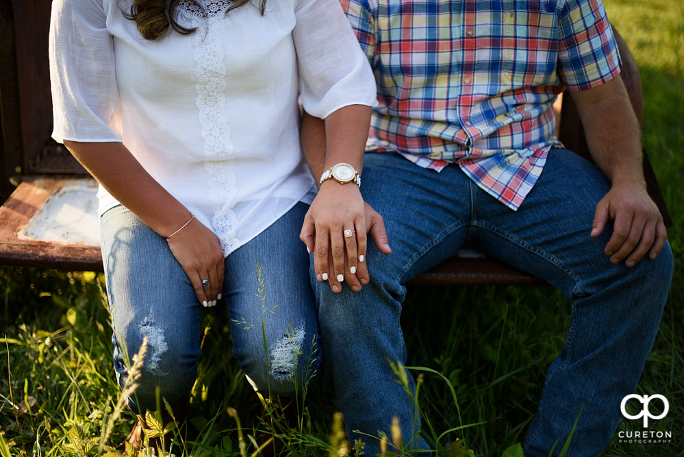 Bride and groom holding hands.