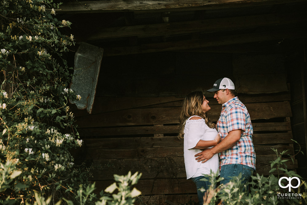 Engaged couple looking at each other.