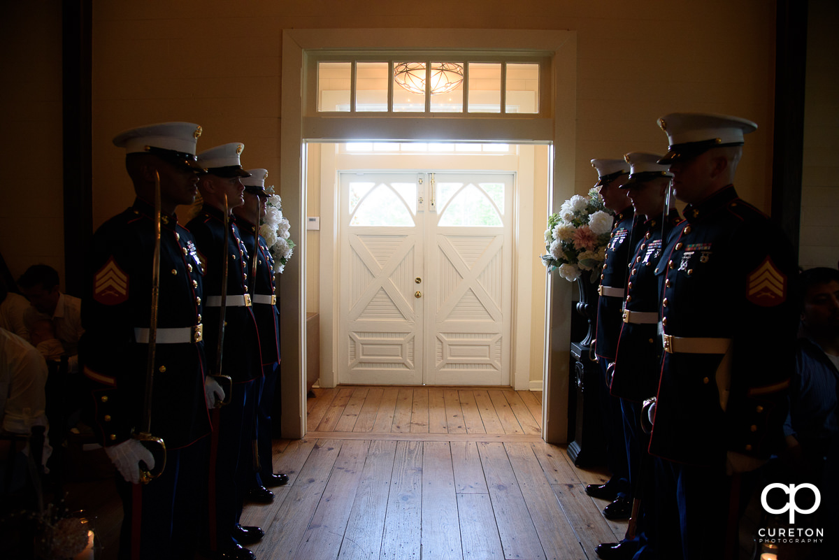 Marines lined up inside the wedding chapel.