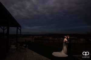 Bride and groom on a rooftop in Greenville.