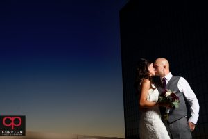 Bride and groom during sunset at their commerce club wedding.