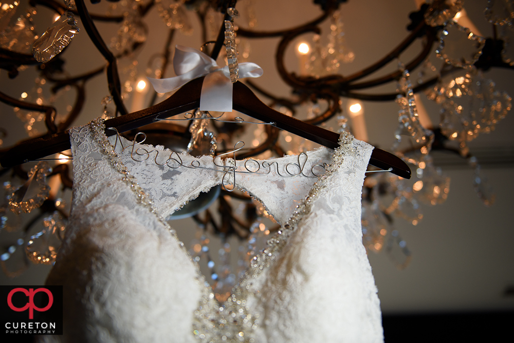 Custom hanger for the bridal dress.