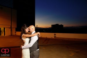 Bride and groom at sunset at the commerce club.