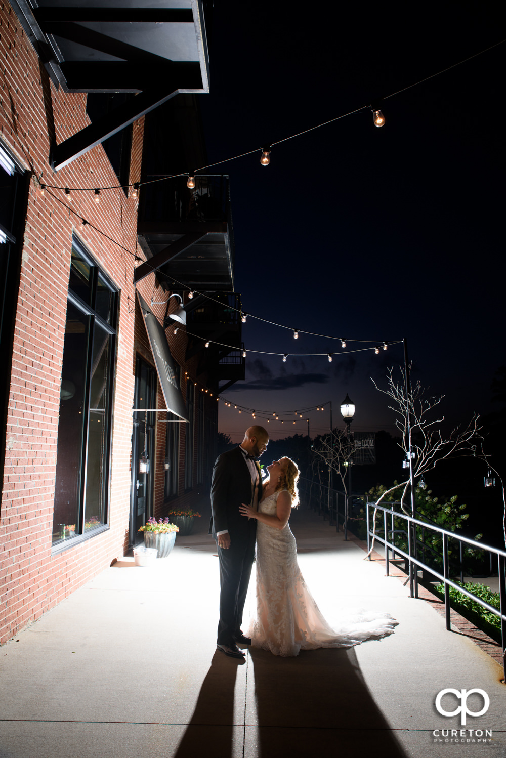 Bride and Groom after their wedding at The Loom at Cotton Mill Place in Simpsonville,SC.